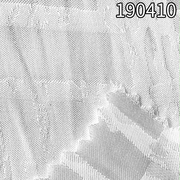 190410人丝人棉大提花面料 107g粘胶面料不规则提格子面料